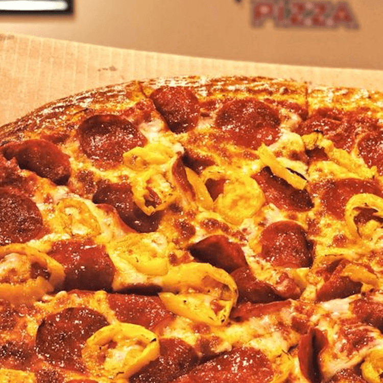 Buy a 12 Cut X-Large Pizza & Get Up to Two Toppings Special