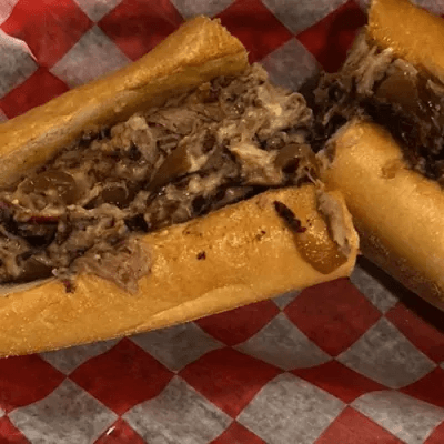 Pulled Pork Cheese Steak Sandwich.