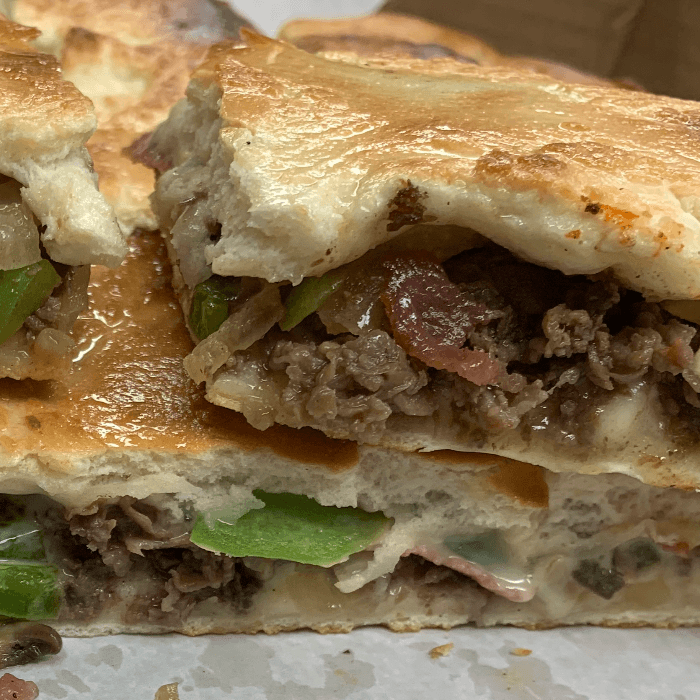 Steak Bomb Peppers, Onions, Mushrooms, Salami, Cheese Calzone (Small 10")