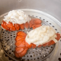 10 Oz Ribeye & 4 Oz Lobster Tail.