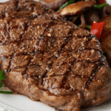 Grilled Sirloin Strip Steak, Sauteed Onions & Mushrooms