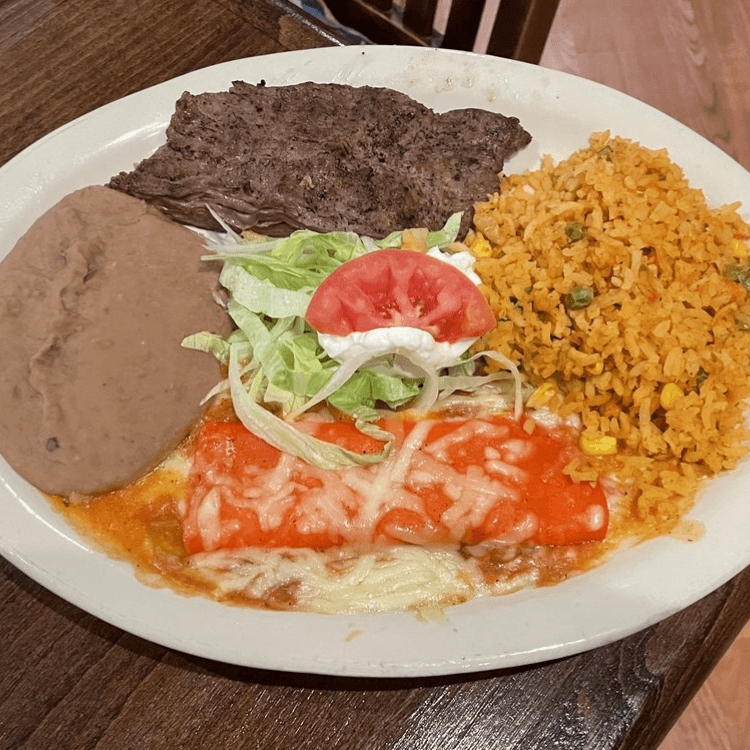 Tampiquena;    Charbroiled Black Angus Certified Skirt Steak and Enchilada.