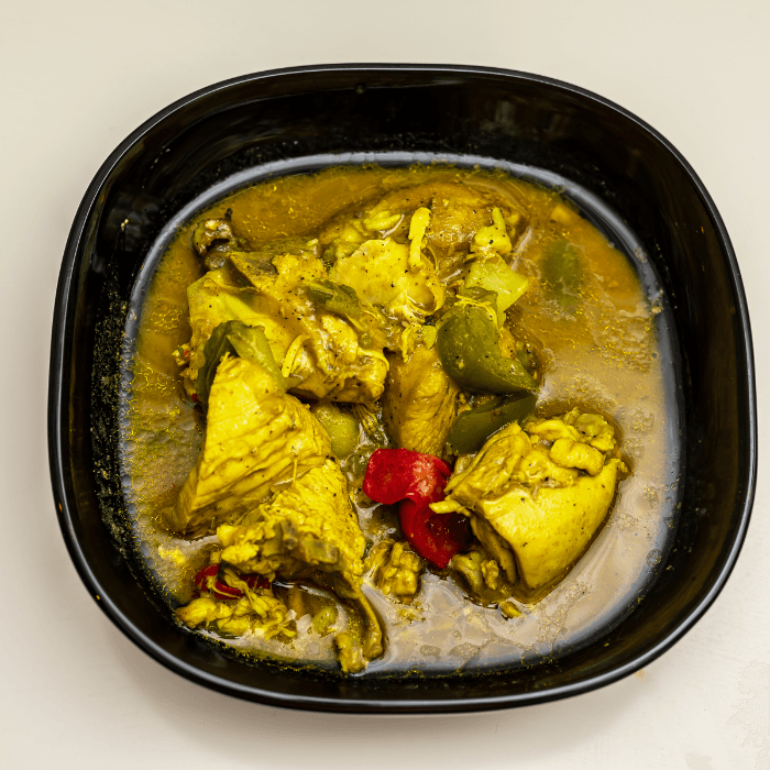 Caribbean Curry Delights: Jerk Chicken, Roti, Goat Curry