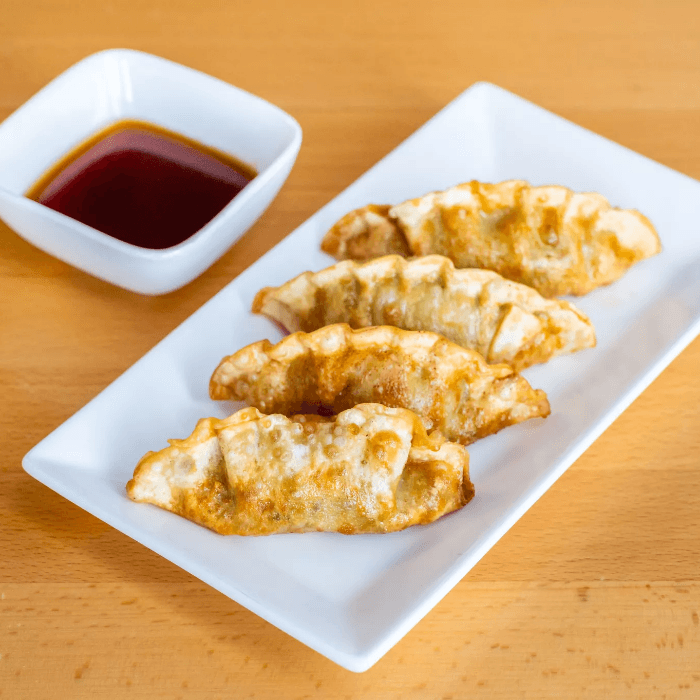 8. Fried Pork Dumplings (4 Pieces)