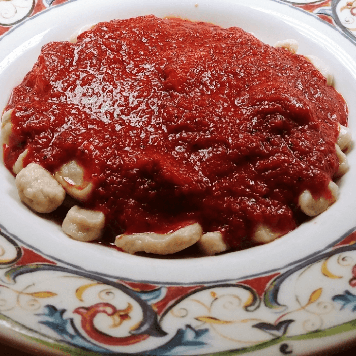 Small homemade Gnocchi with red sauce