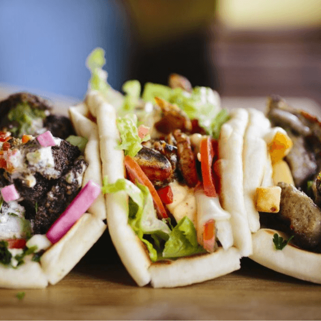 Greek Gyro. (Lettuce, Tomatoes, Onions, Feta, Kalamata Olives, & Tzatziki Sauce)