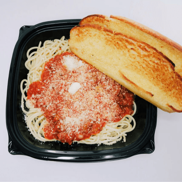 Spaghetti Dinner With Garlic Toast and Parmesan.